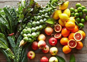 a group of fruits and vegetables on a wood surface Healthy Weight Loss Diets Craigmillar